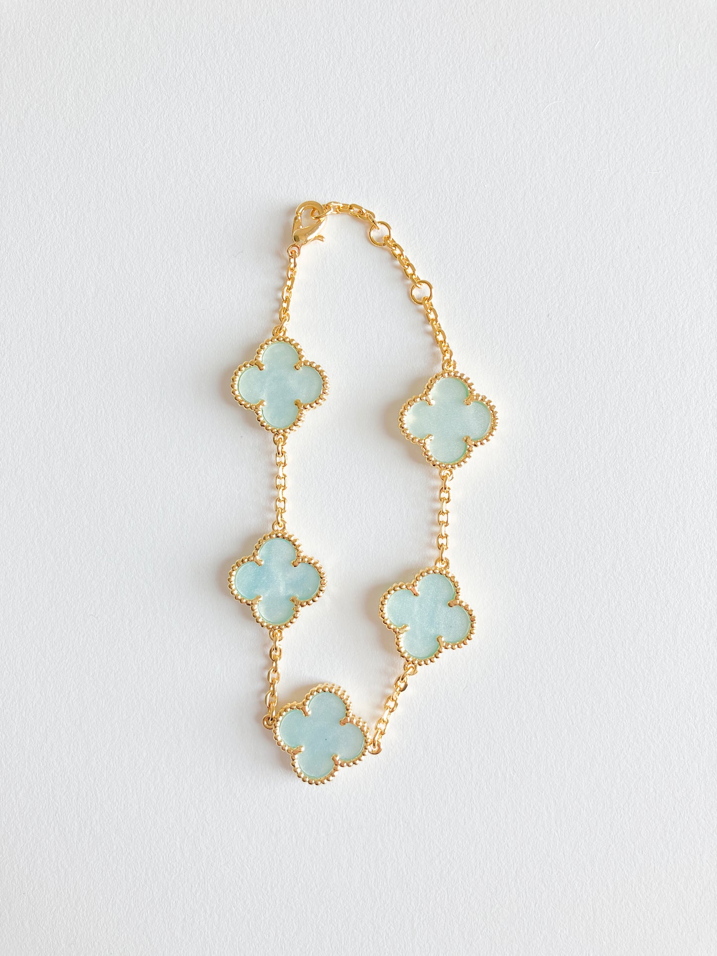 Blue Mother of Pearl Quatrefoil Bracelet in Gold