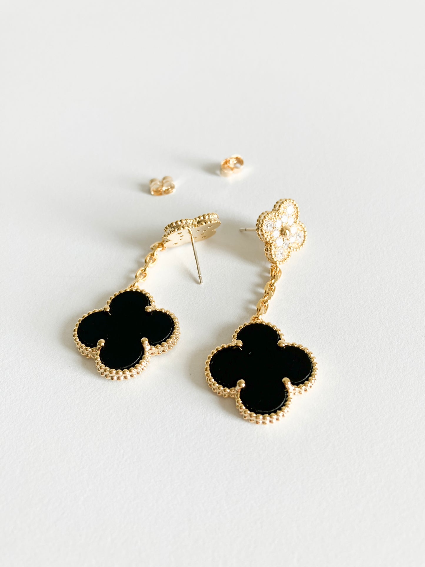 Cubic Zirconia and Onyx Quatrefoil Double Drop Earrings in Gold