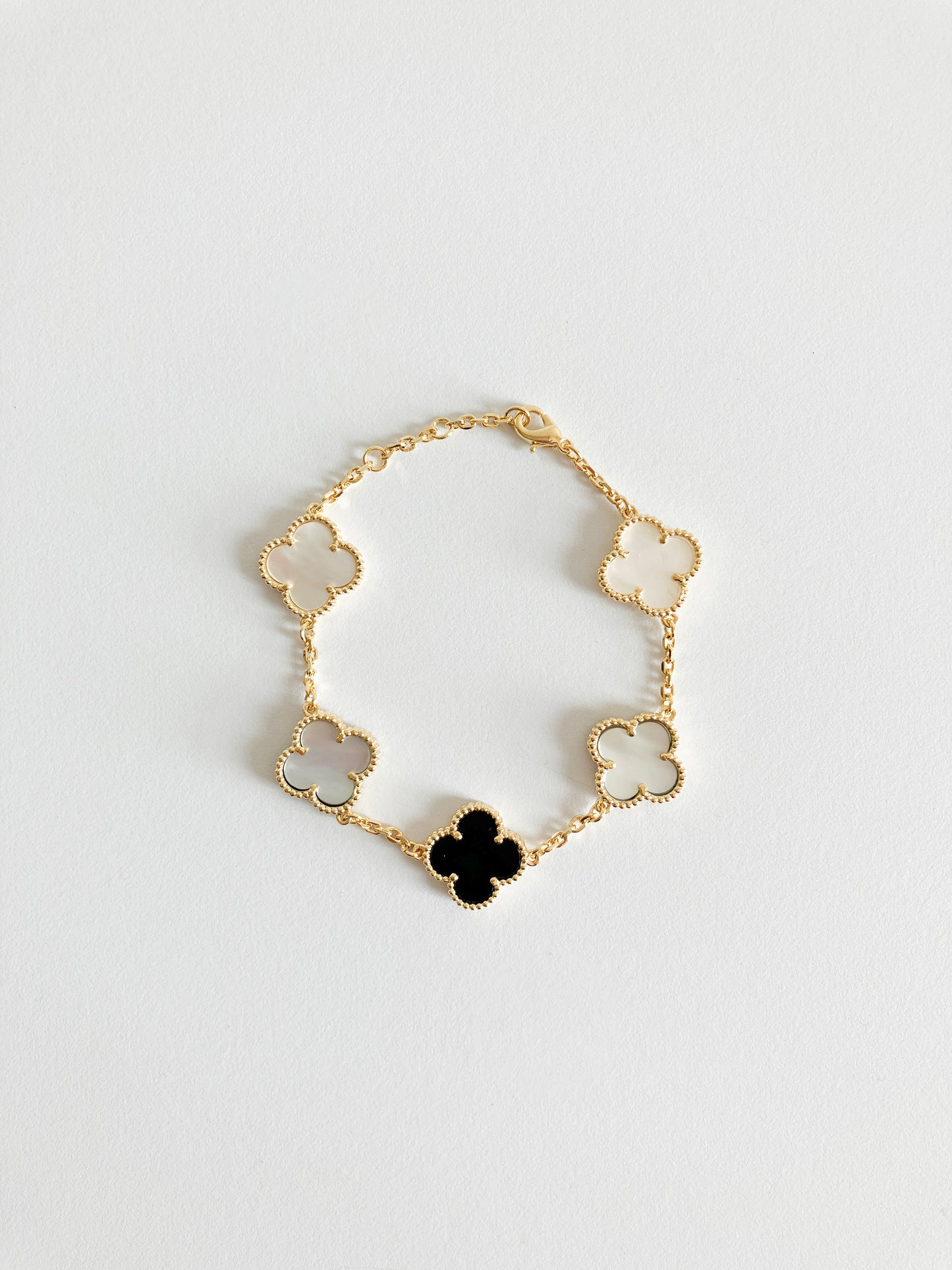 Mixed Mother of Pearl and Onyx Demi Quatrefoil Bracelet in Gold