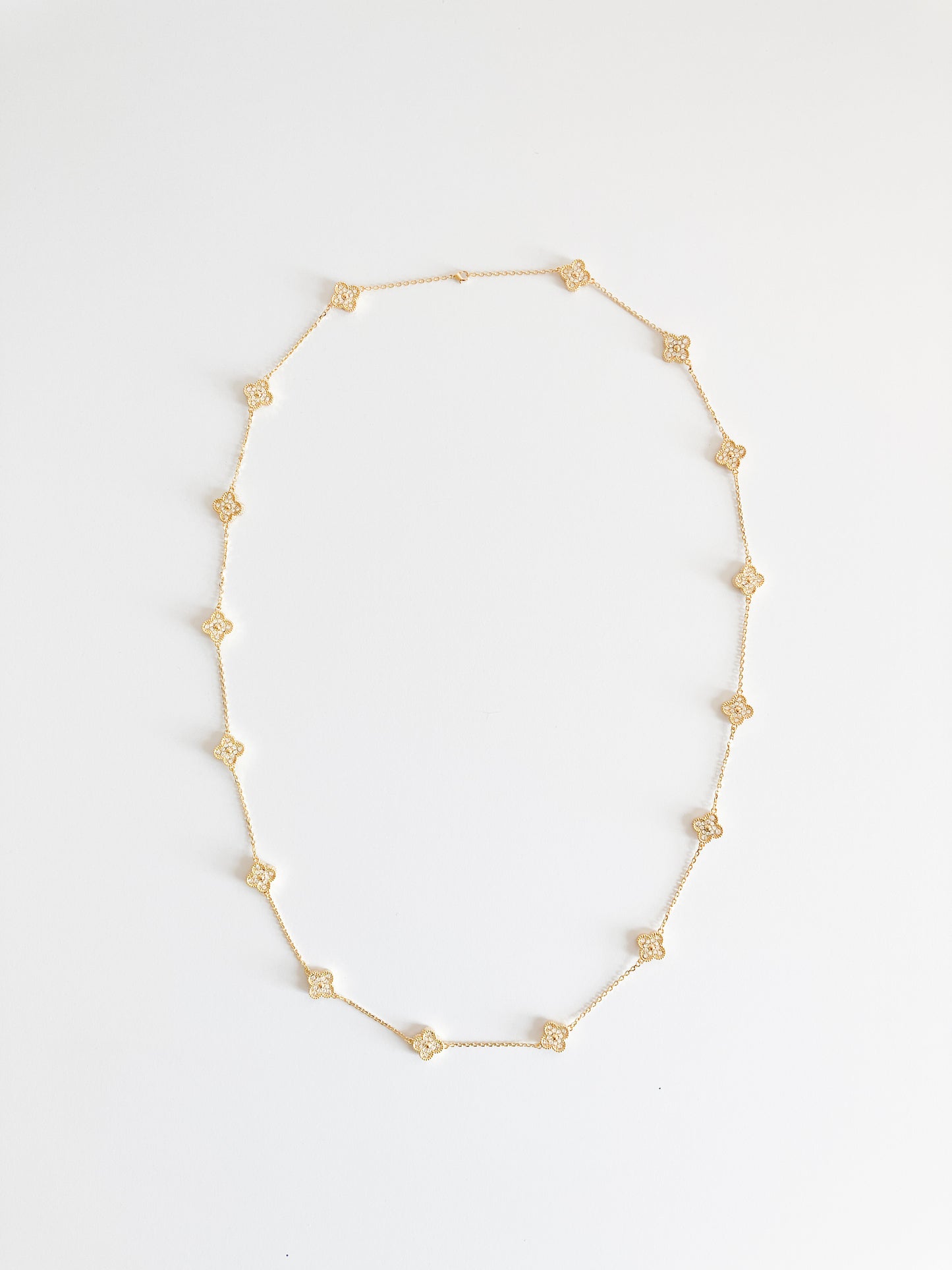 Opera Length Cubic Zirconia Quatrefoil Necklace in Gold