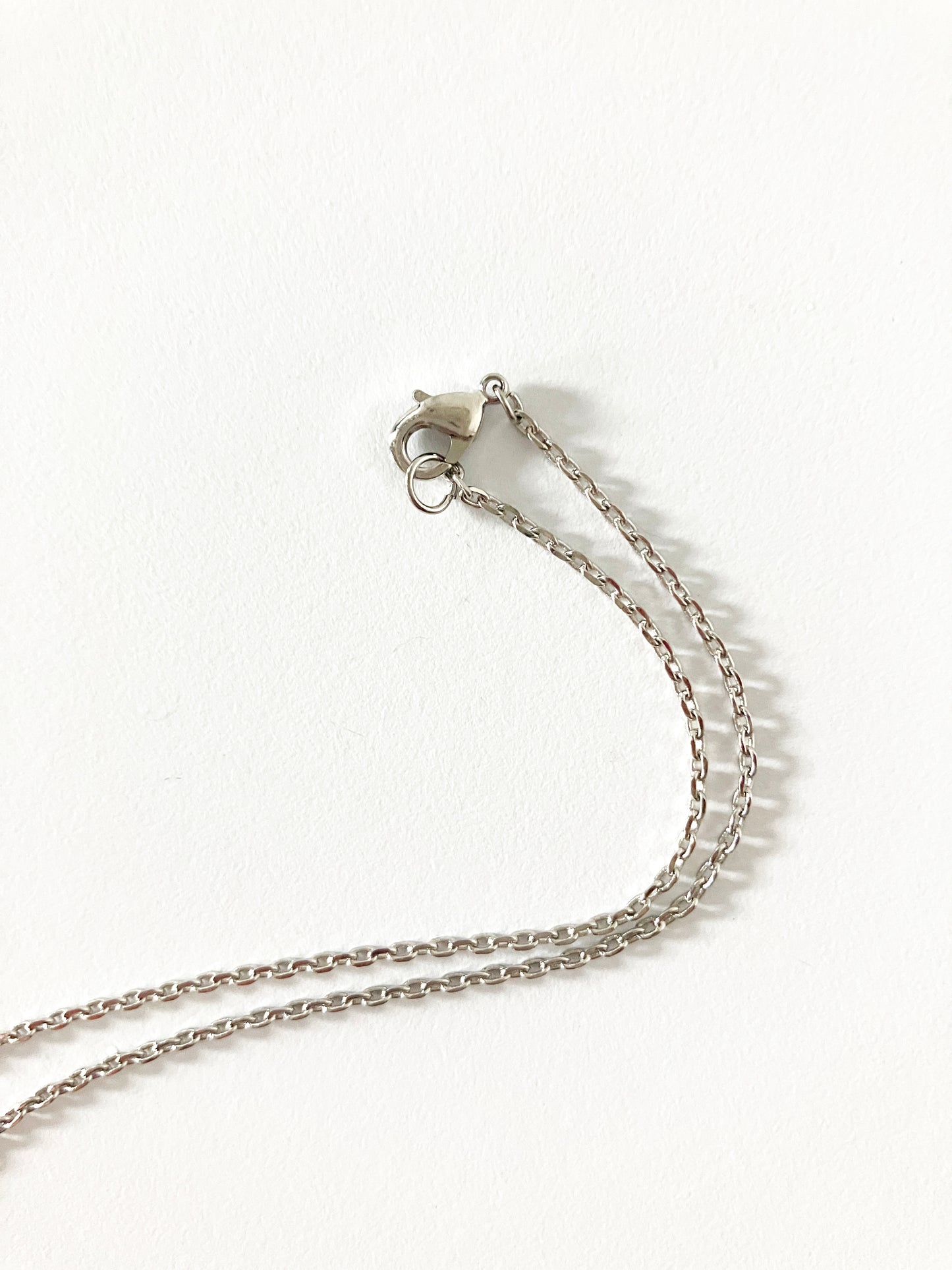 Large Gray Mother of Pearl Quatrefoil Motif Pendant in Silver
