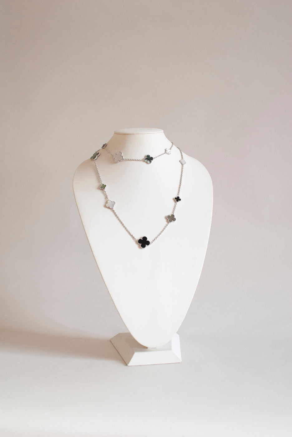 Mixed Size Onyx and White and Gray Mother of Pearl Quatrefoil Silver Plated Necklace