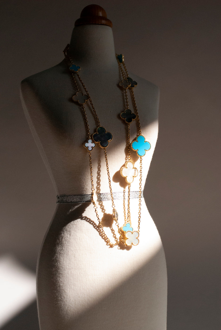 Mixed Size Turquoise and White and Gray Mother of Pearl Quatrefoil Gold Plated Necklace