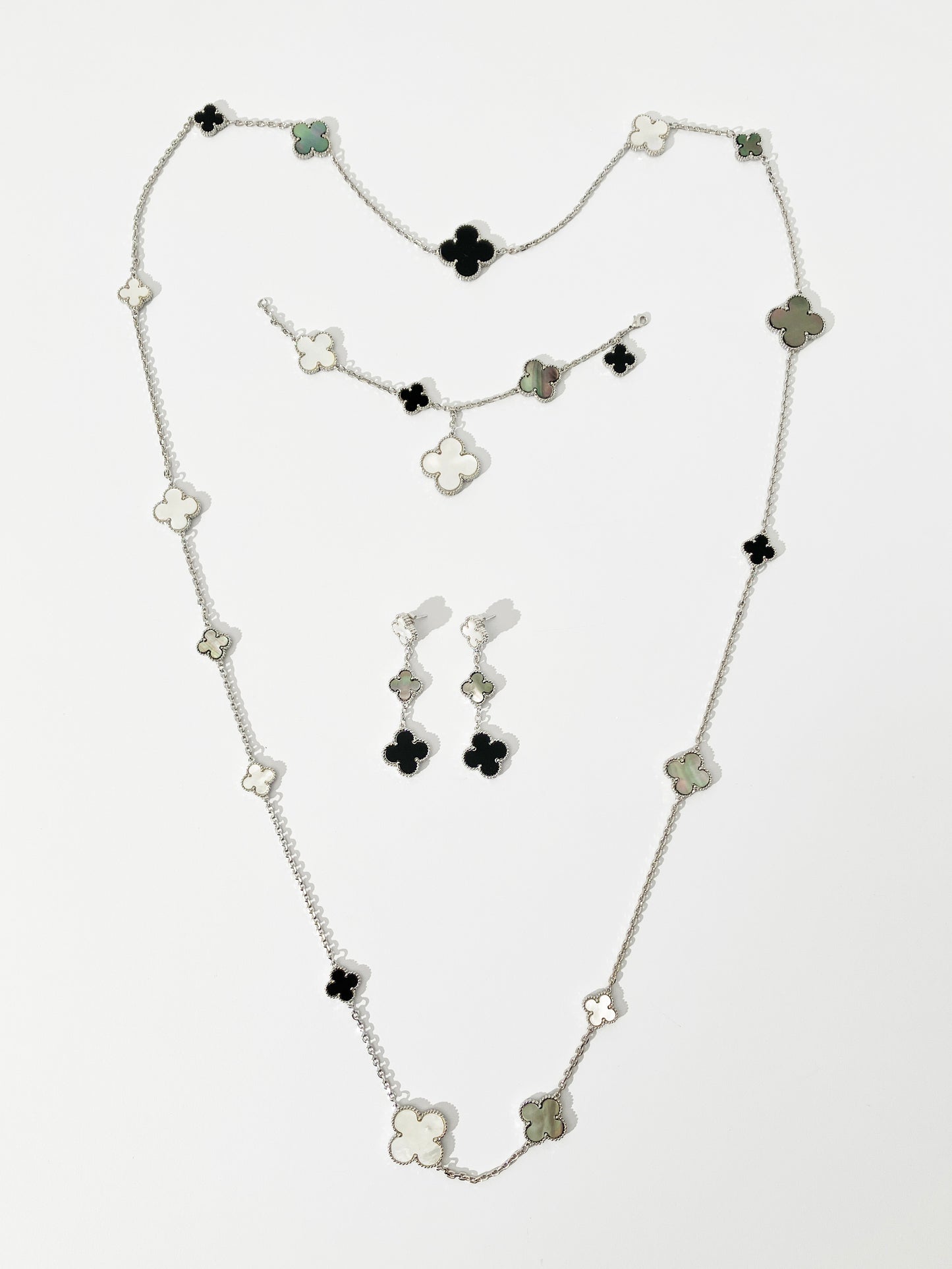 Mixed Mother of Pearl and Onyx Quatrefoil Motif Parure in Silver