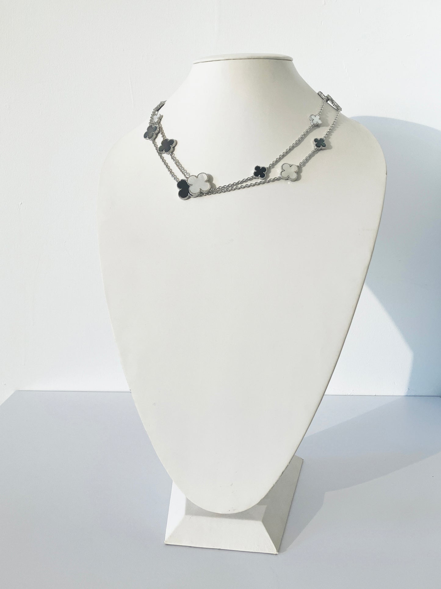 Mixed Mother of Pearl and Onyx Quatrefoil Motif Parure in Silver
