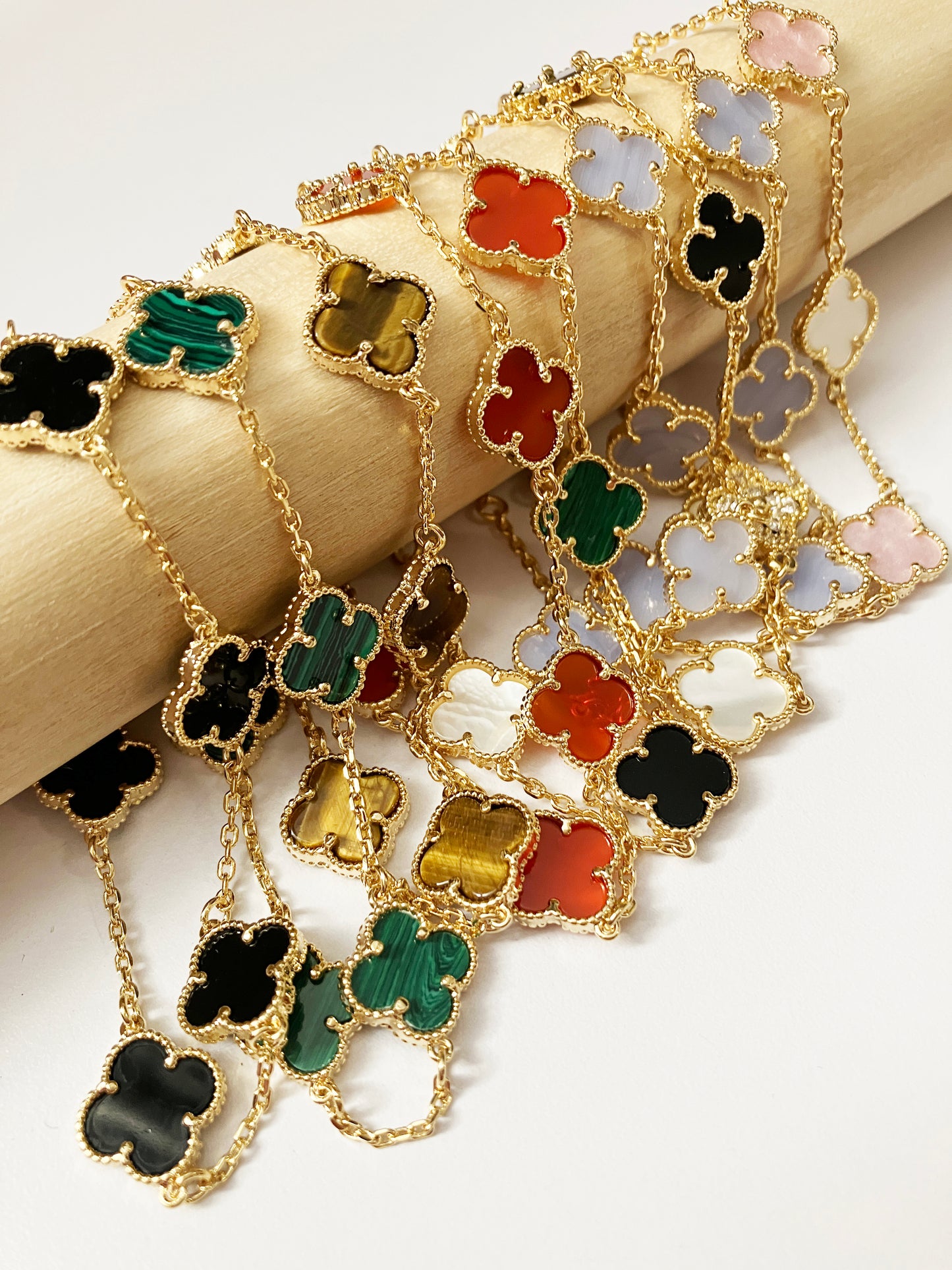 Adjustable 7.5" Onyx, Carnelian, Malachite and Mother of Pearl Quatrefoil Bracelet