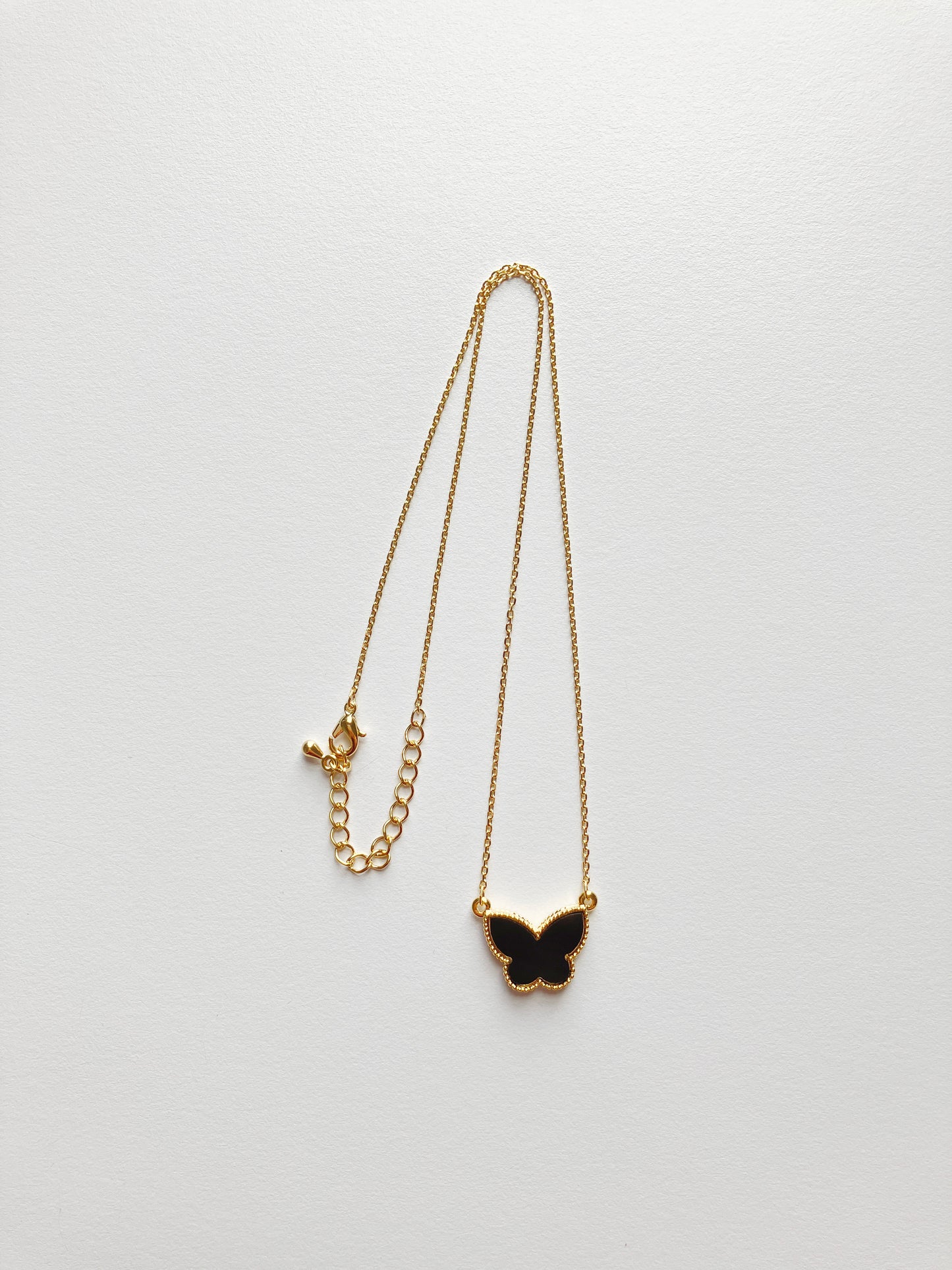 Adjustable Onyx Butterfly Motif Pendant
