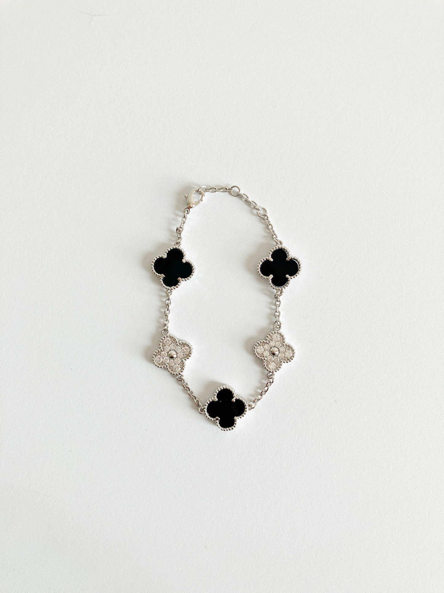 Cubic Zirconia and Onyx Demi Quatrefoil Bracelet in Silver