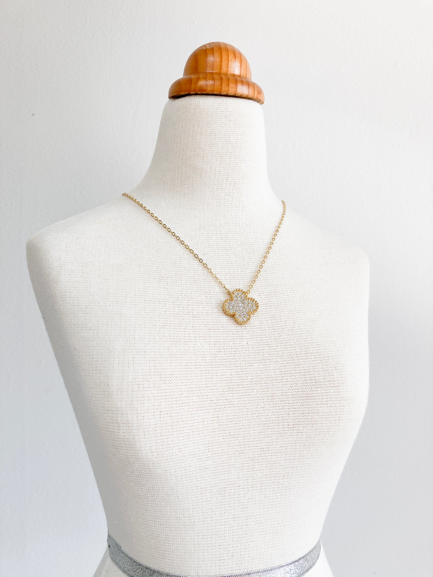 Cubic Zirconia Demi Quatrefoil Pendant in Gold