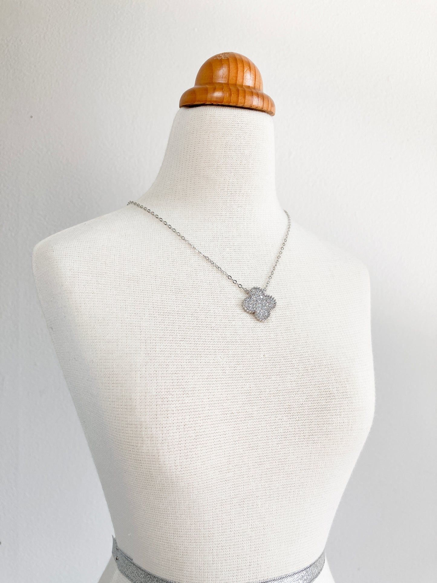 Cubic Zirconia Demi Quatrefoil Pendant in Silver