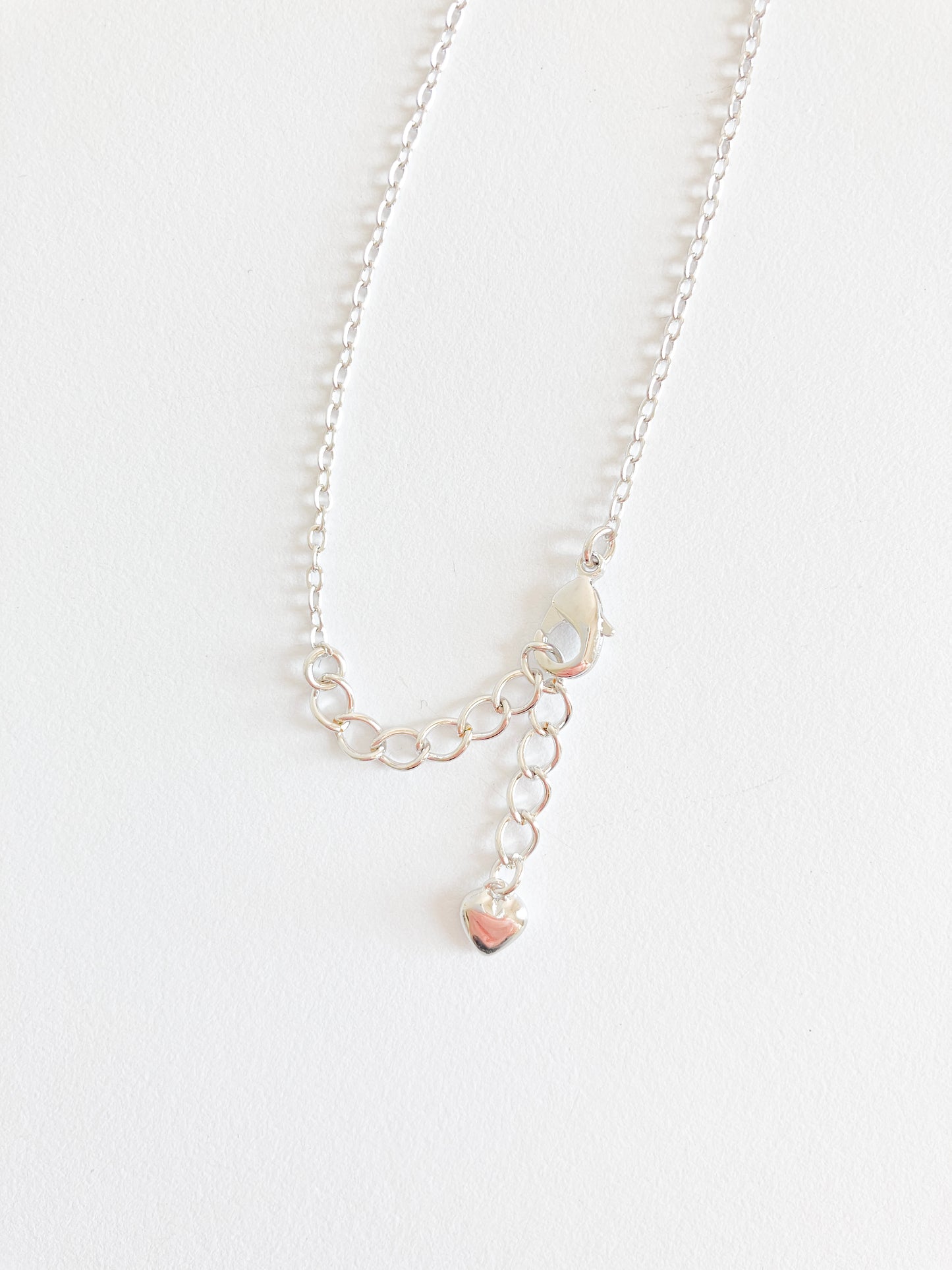 Cubic Zirconia Demi Quatrefoil Pendant in Silver