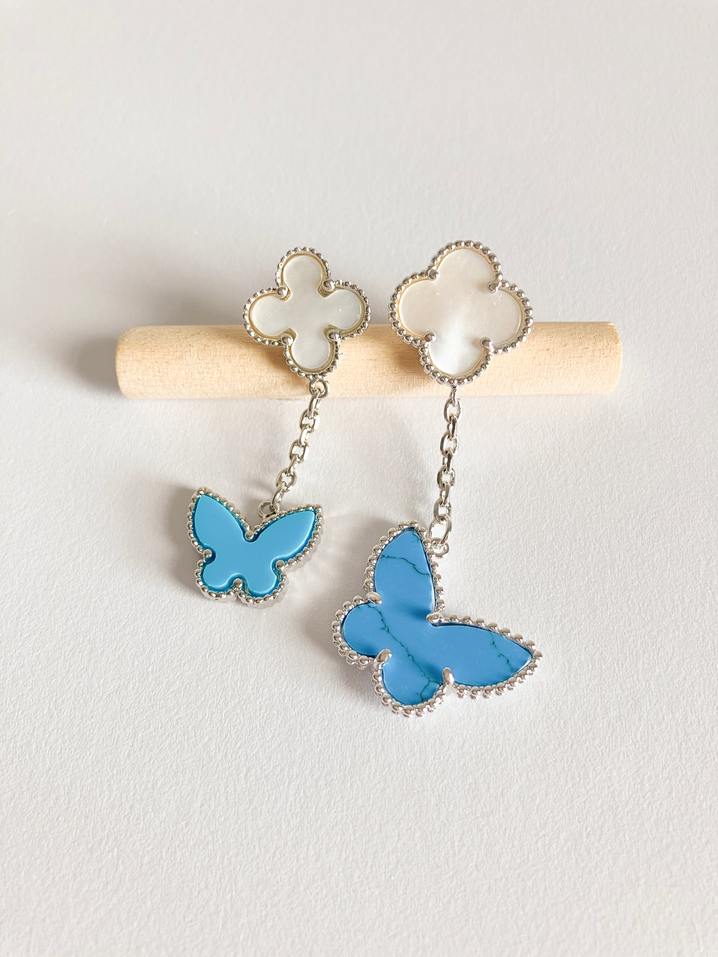 Opulent Mother of Pearl Quatrefoil and Turquoise Butterfly Drop Earrings in Silver