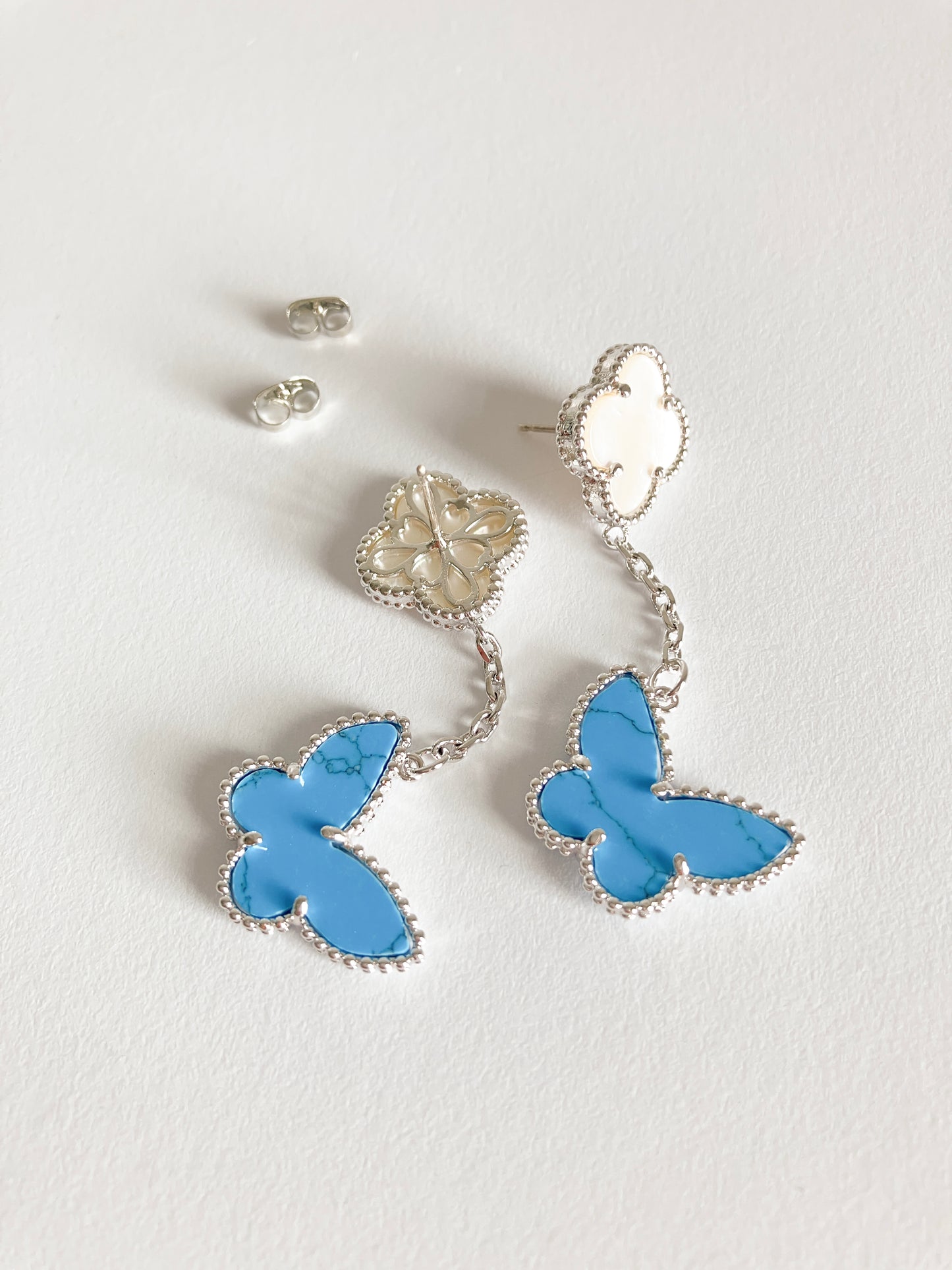 Opulent Mother of Pearl Quatrefoil and Turquoise Butterfly Drop Earrings in Silver