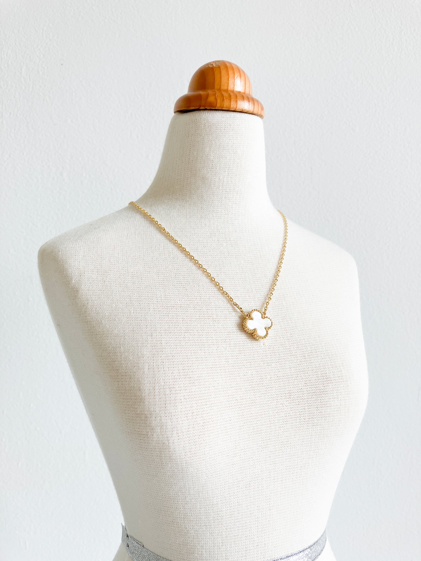 Demi Mother of Pearl Quatrefoil Motif Pendant in Gold
