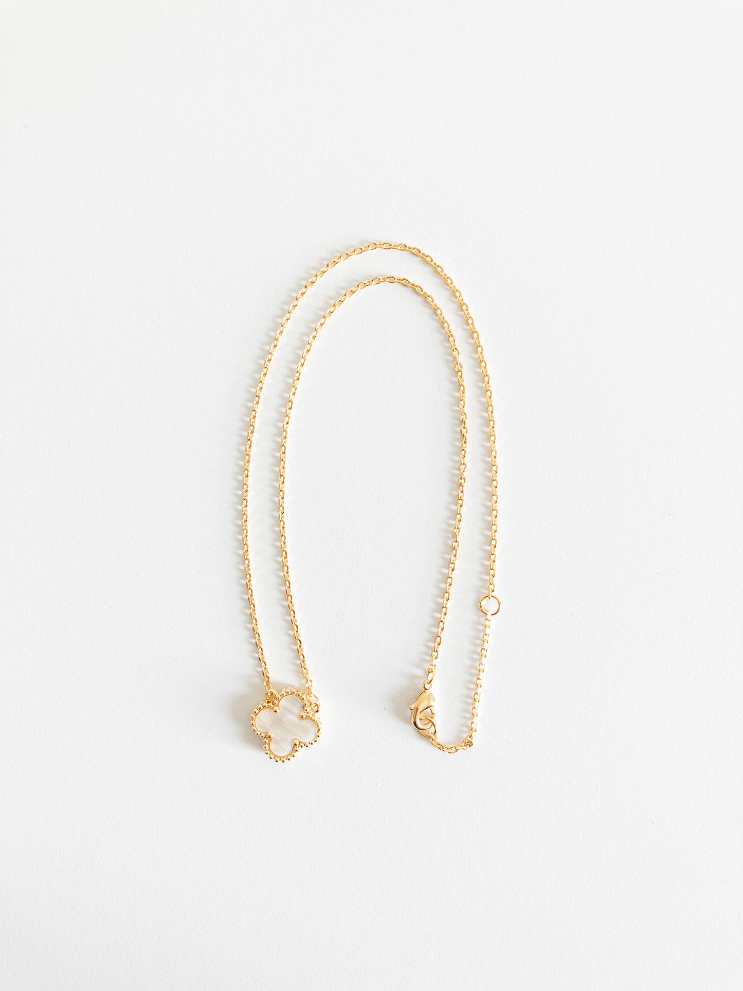 Demi Mother of Pearl Quatrefoil Motif Pendant in Gold