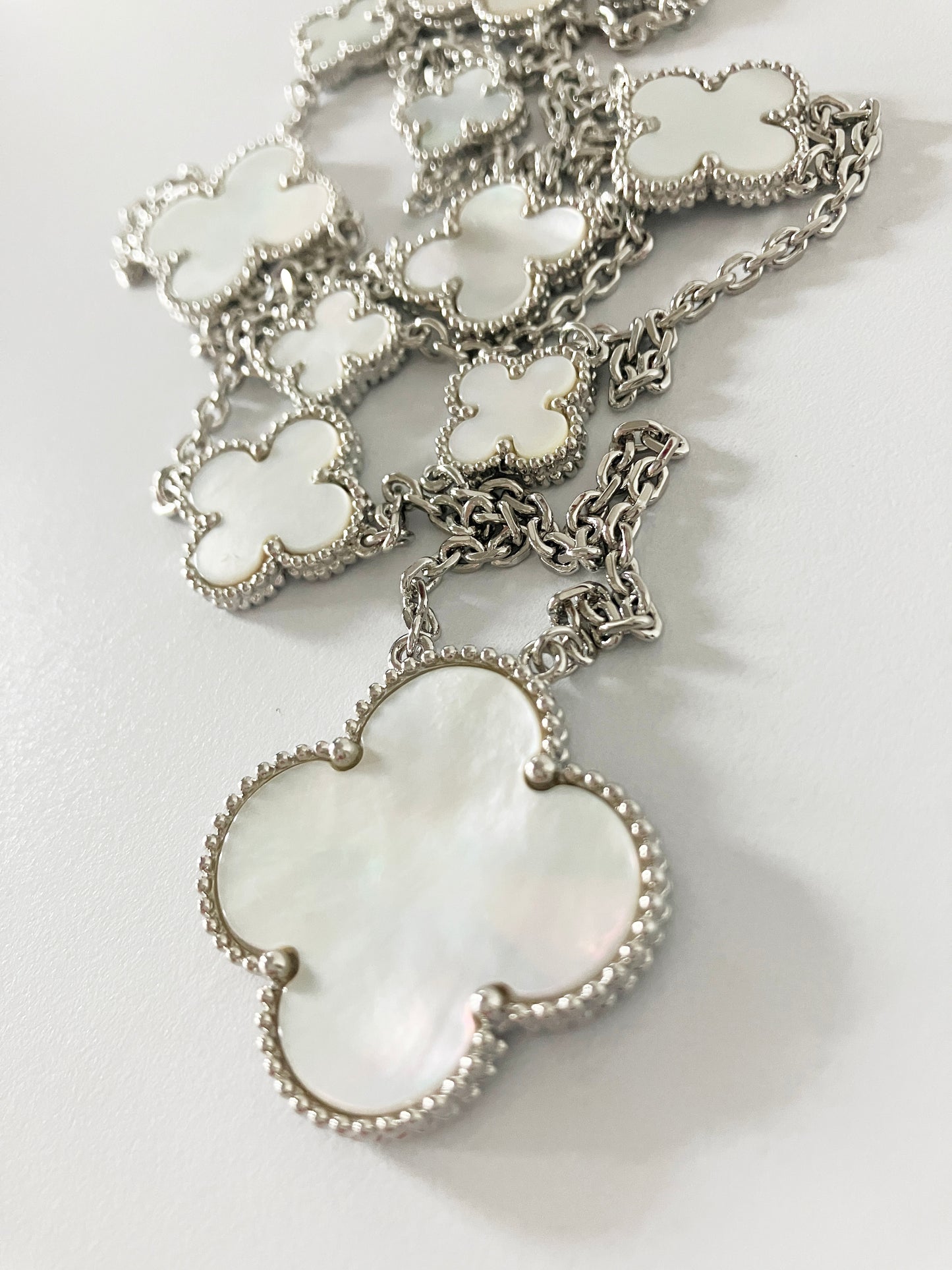 Mixed Size Mother of Pearl Quatrefoil Silver Plated Pendant