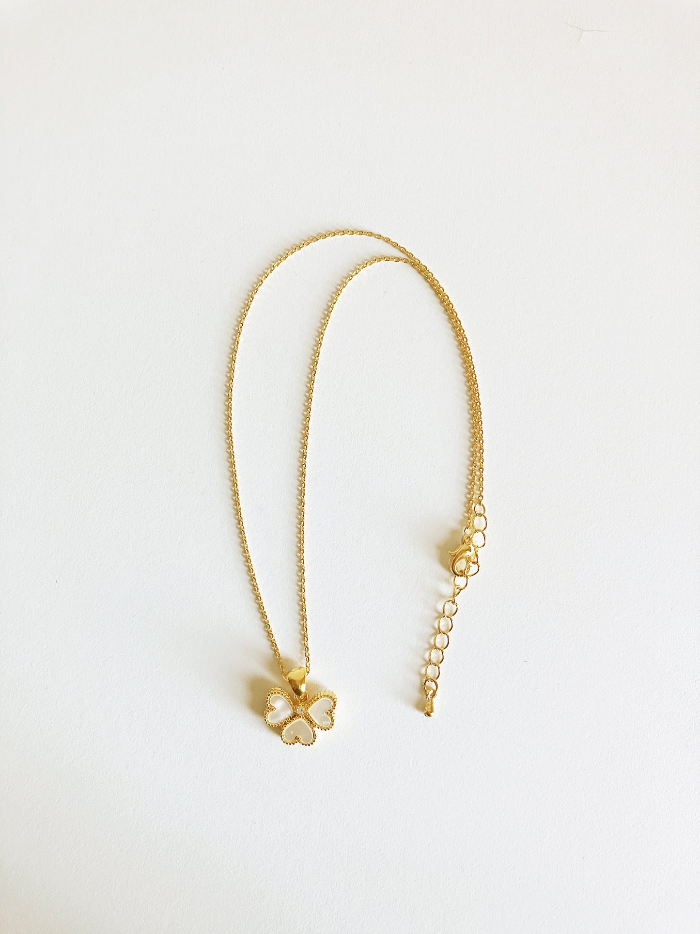 Clover of Hearts in Mother of Pearl and Cubic Zirconium Set in Gold