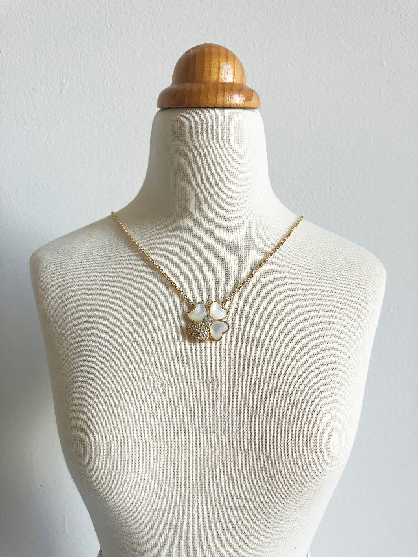 Four Leaf Clover of Hearts in Mother of Pearl and Cubic Zirconium Set in Gold