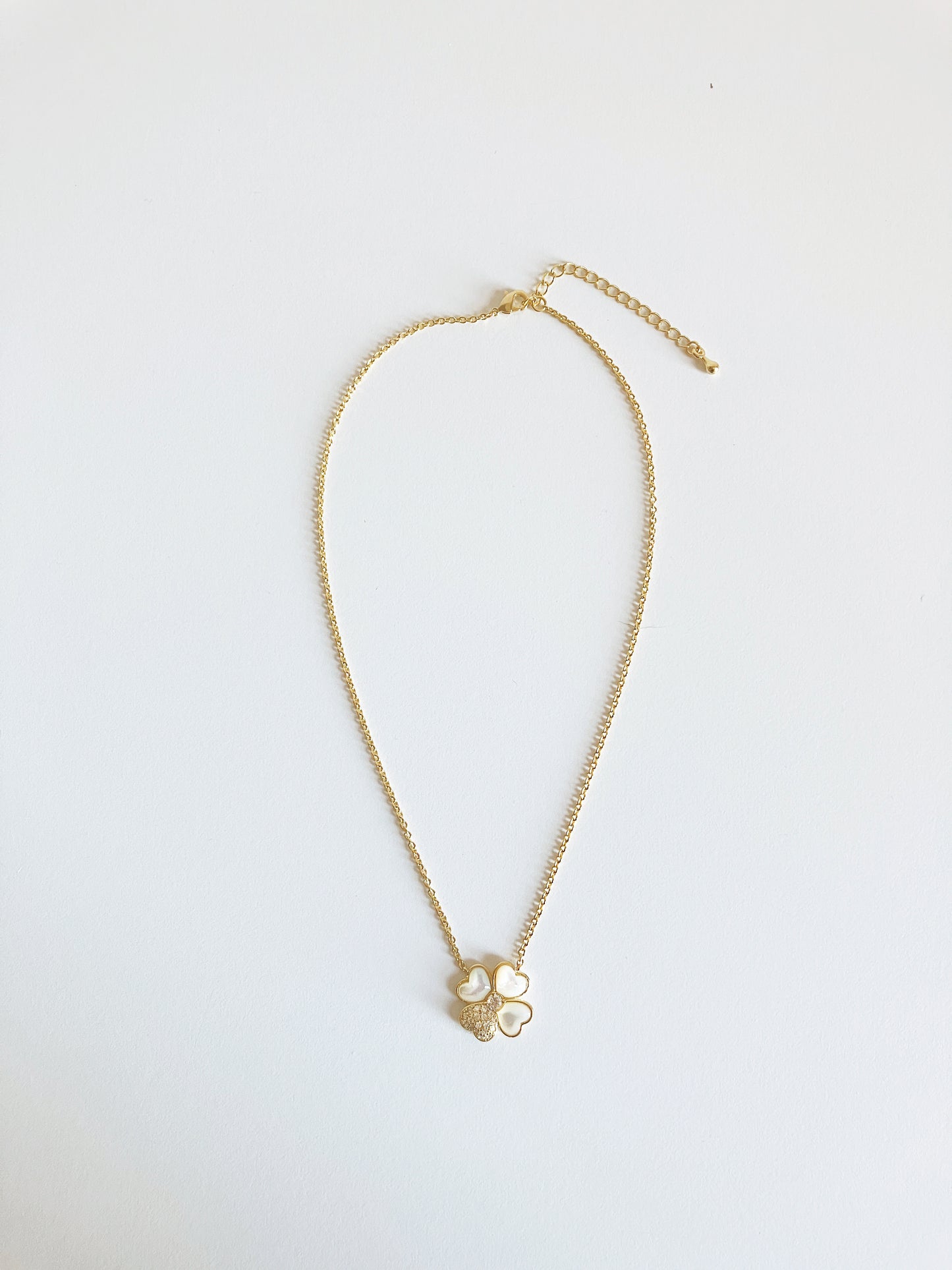 Four Leaf Clover of Hearts in Mother of Pearl and Cubic Zirconium Set in Gold