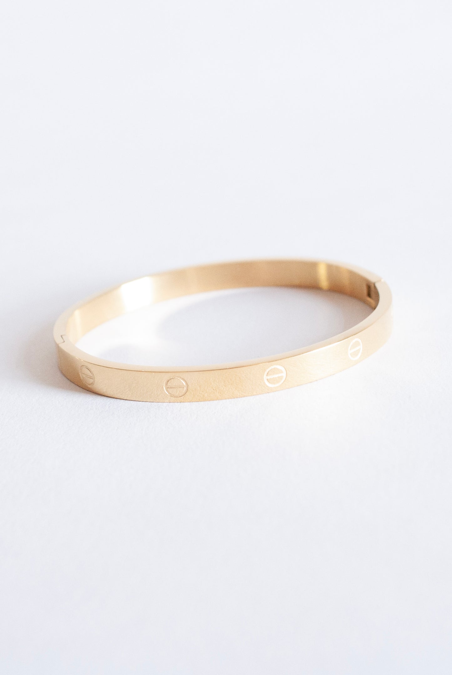 Screw Head Pattern Yellow Gold Bangle