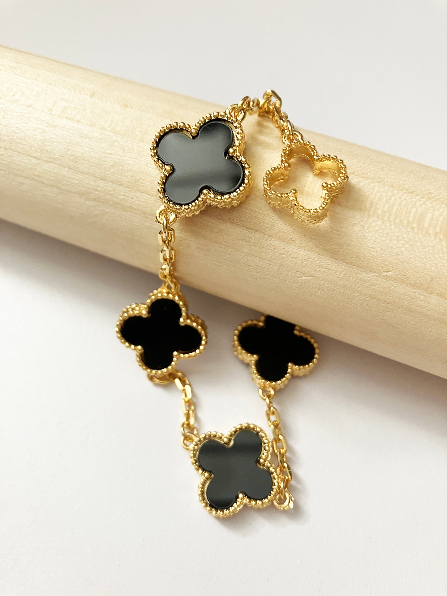 Quatrefoil Motif Gold and Onyx Earrings