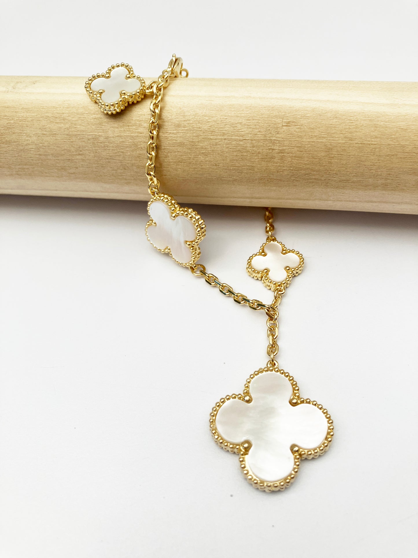 Mother of Pearl Quatrefoil Motif Charm Bracelet in Gold