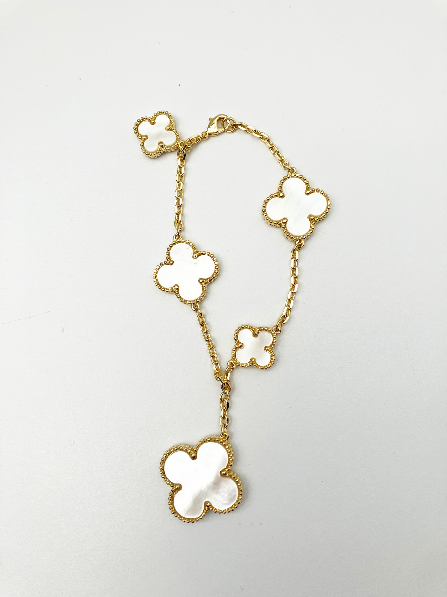 Mother of Pearl Quatrefoil Motif Charm Bracelet in Gold