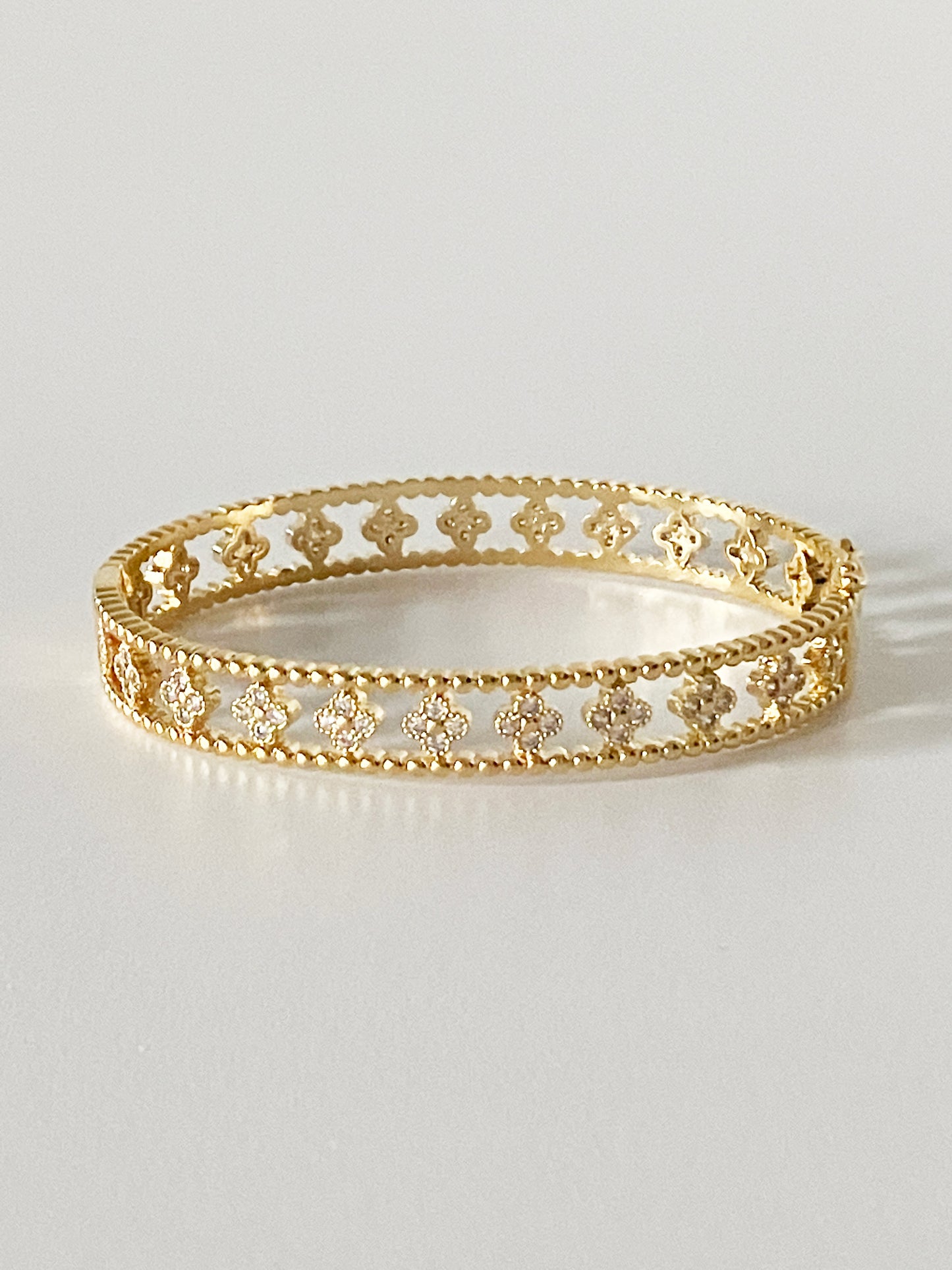 Large Floral Openwork Bangle in Gold and Cubic Zirconia
