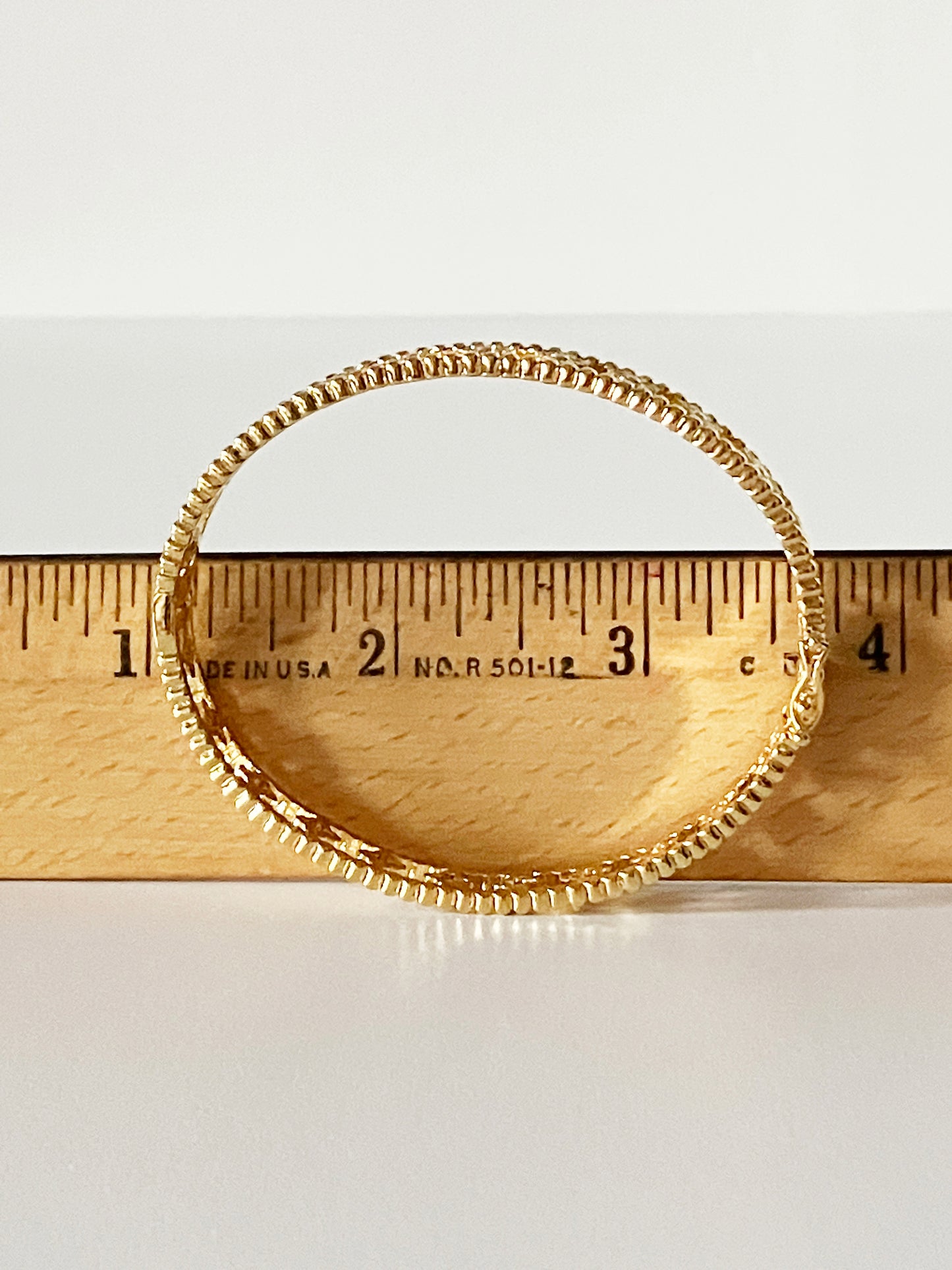 Large Floral Openwork Bangle in Gold and Cubic Zirconia